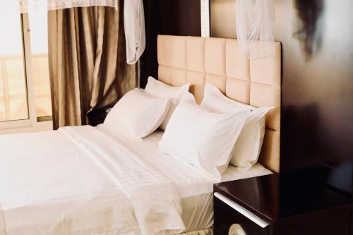 Voodi või voodid majutusasutuse Landmark Mbezi Beach Resort toas