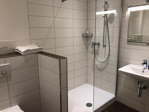 Koupelna v ubytování Hotel-Gasthof Flötzinger Bräu