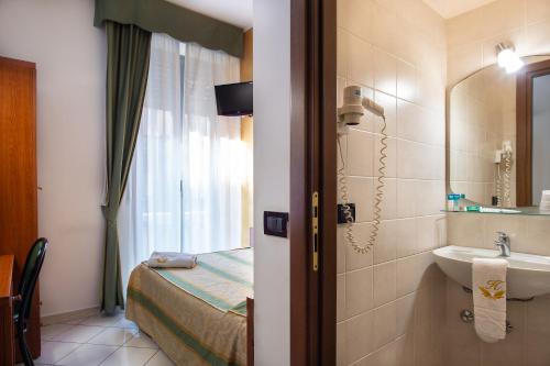 Ett badrum på Hotel Dorè