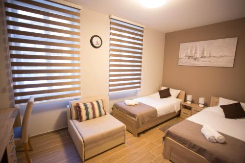 Cama o camas de una habitación en Centar lux 2