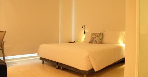 Кровать или кровати в номере Del Mar Hotel