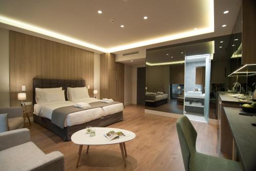 Postel nebo postele na pokoji v ubytování Athens Platinum Rooms and Suites