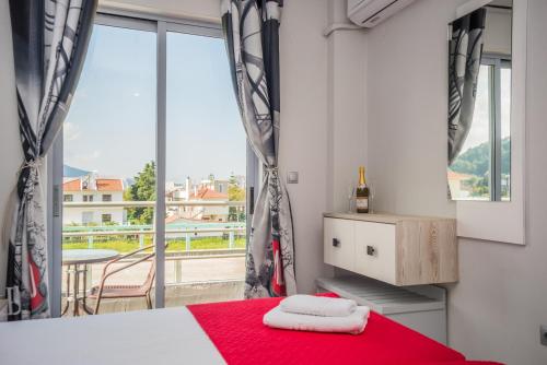 Posteľ alebo postele v izbe v ubytovaní Maritina Apartments