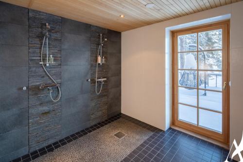 Koupelna v ubytování Villa Aurorastone, Lapland, Finland