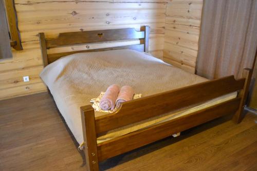 Postel nebo postele na pokoji v ubytování sodyba "Vilkasalė"