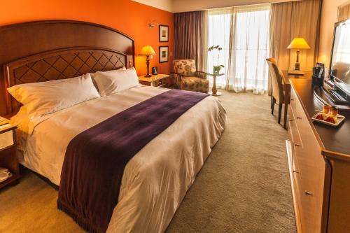 En eller flere senge i et værelse på Bourbon Atibaia Resort