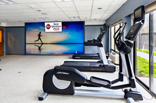 a gym with two tread machines in a room at Best Western Plus Bellingham in Bellingham
