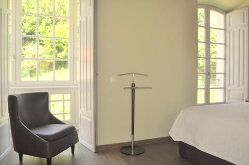 Ένα ή περισσότερα κρεβάτια σε δωμάτιο στο Casona la Sierra