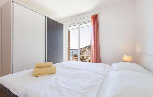 Postel nebo postele na pokoji v ubytování Apartments Villa Amalia
