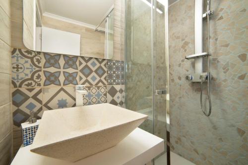 Phòng tắm tại O Quintal Guesthouse