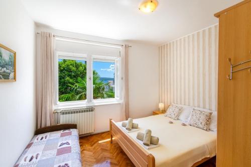 Krevet ili kreveti u jedinici u objektu One-Bedroom Apartment in Crikvenica V