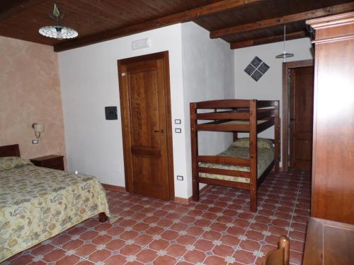 Postel nebo postele na pokoji v ubytování Agriturismo Pinturicchio