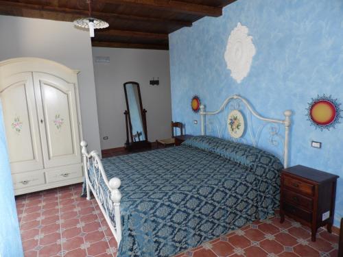 Postel nebo postele na pokoji v ubytování Agriturismo Pinturicchio