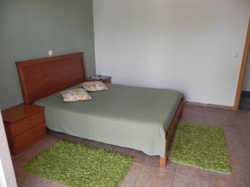 Cama o camas de una habitación en Lareira do Pinheirinho