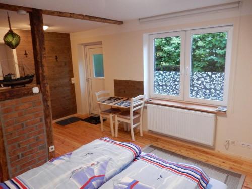 Postel nebo postele na pokoji v ubytování Apartment in Putbus I