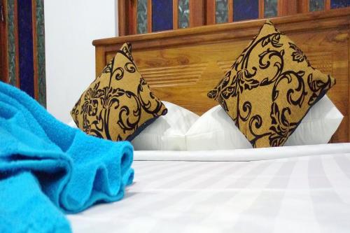 Postel nebo postele na pokoji v ubytování Nilowin Glenanore Guesthouse