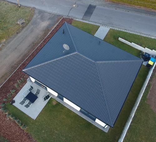 an overhead view of a blue roof on a house at Ferienhaus Stricker in Birken-Honigsessen