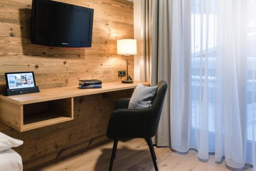 TV a/nebo společenská místnost v ubytování meiZeit Lodge