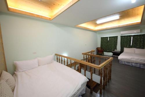 Vuode tai vuoteita majoituspaikassa Cup Runneth B&B
