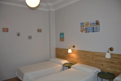 Pensión Moratin tesisinde bir odada yatak veya yataklar