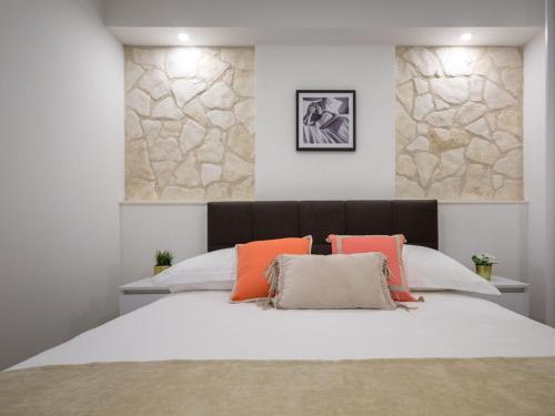 Un pat sau paturi într-o cameră la Apartment Villa Franko Maris