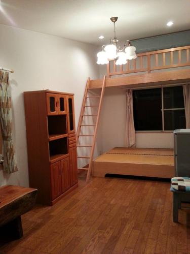 Ένα ή περισσότερα κρεβάτια σε δωμάτιο στο Ocean Home Guest House