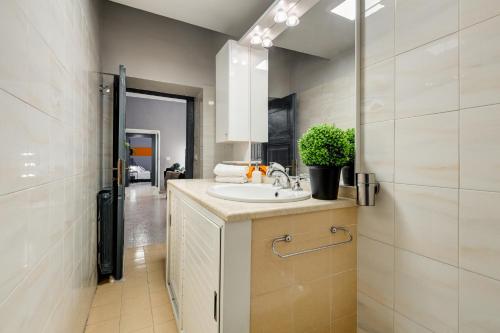 Ванная комната в TRIDENTE Apartment