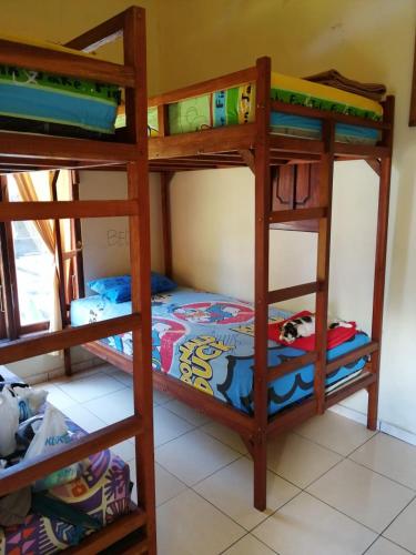 Ένα ή περισσότερα κρεβάτια σε δωμάτιο στο Family Hostel