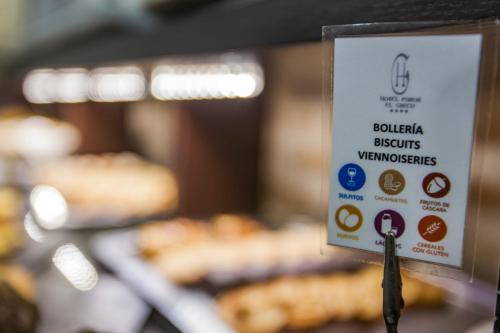 a sign that reads bubbles biscuits vancouver supermarkets at Pintor El Greco in Toledo