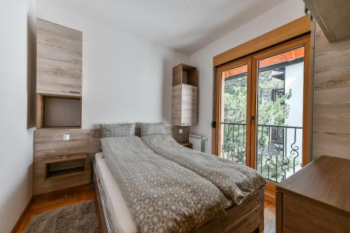 Llit o llits en una habitació de Central point Zlatibor