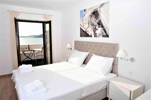 Ліжко або ліжка в номері Villa Bilic