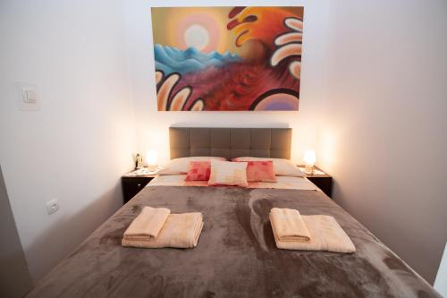 Postel nebo postele na pokoji v ubytování Studio apartman Tasha