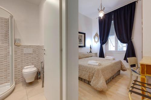 Katil atau katil-katil dalam bilik di Faenza Apartment