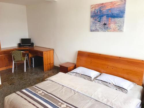 Postel nebo postele na pokoji v ubytování Taining Happy Stone Duplex Apartment