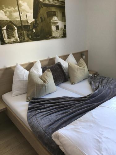 Postel nebo postele na pokoji v ubytování Apart Alpinea