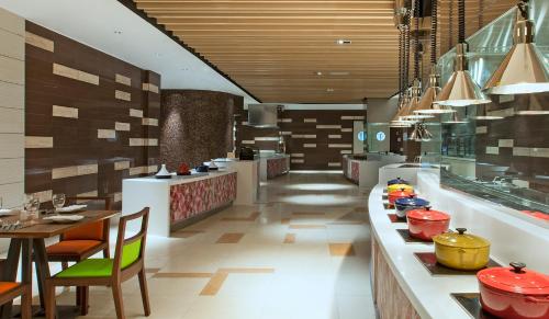 A restaurant or other place to eat at Four Points by Sheraton Sandakan