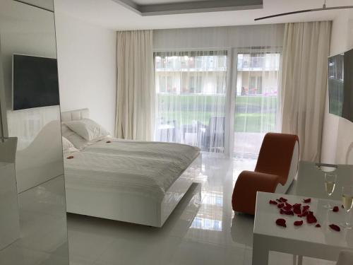 Postel nebo postele na pokoji v ubytování Wellness Apartments in Velence