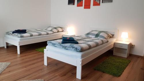 Postel nebo postele na pokoji v ubytování Ferienwohnung-Kormann