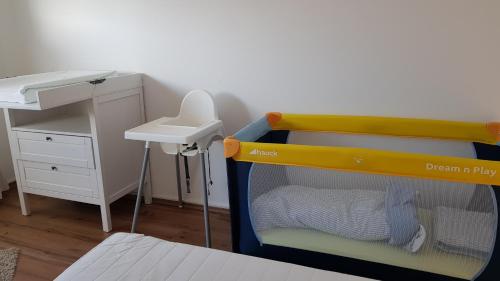 Ένα ή περισσότερα κρεβάτια σε δωμάτιο στο Ferienwohnung-Kormann