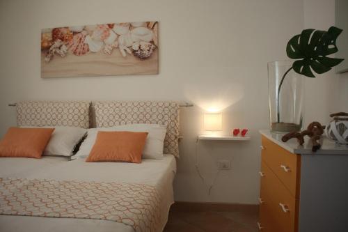 Ein Bett oder Betten in einem Zimmer der Unterkunft Villa Sun Beach
