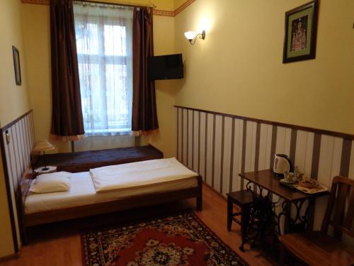 Postel nebo postele na pokoji v ubytování Globtroter Guest House