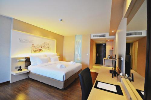 Katil atau katil-katil dalam bilik di Parinda Hotel