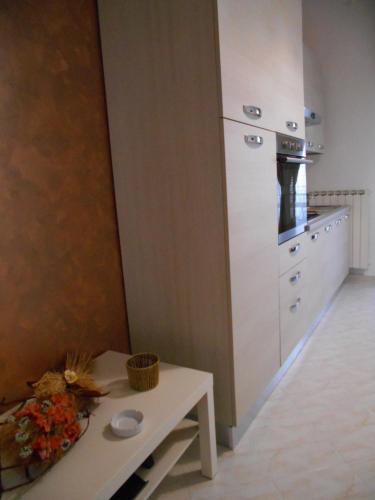 Dapur atau dapur kecil di Appartamento mare e monti Two