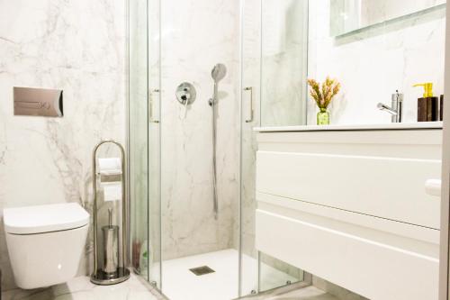 Um banheiro em Graça Apartment