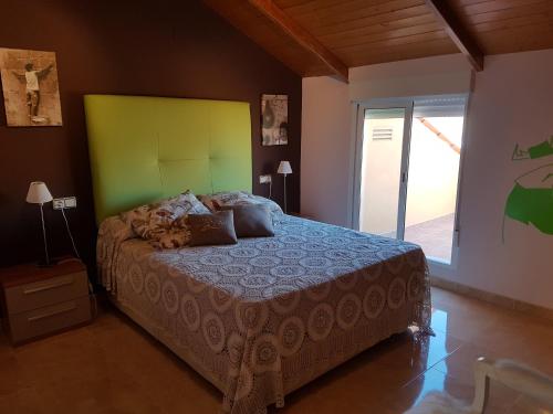 Posteľ alebo postele v izbe v ubytovaní Atico Duplex Llandells 21