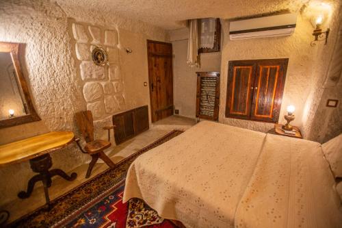 Katil atau katil-katil dalam bilik di Koza Cave Hotel