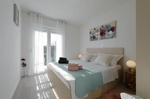 Ένα ή περισσότερα κρεβάτια σε δωμάτιο στο Holiday Home Hrast