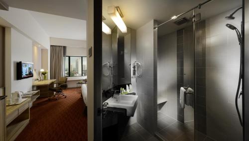 a bathroom with a sink and a shower at Sunway Hotel Georgetown Penang in George Town