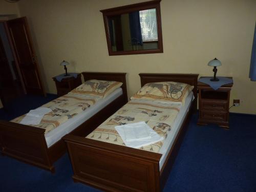 Postel nebo postele na pokoji v ubytování Hotel Paradise