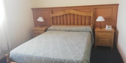 Кровать или кровати в номере HOTEL CONTINENTAL COSQUIN